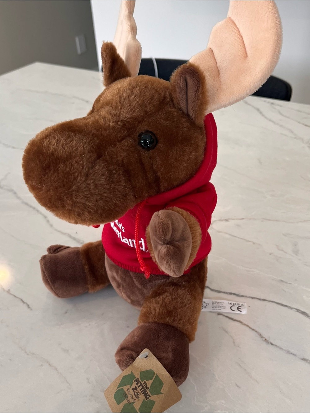 Plush Brown Moose in Red Canada’s Wonderland Hoodie